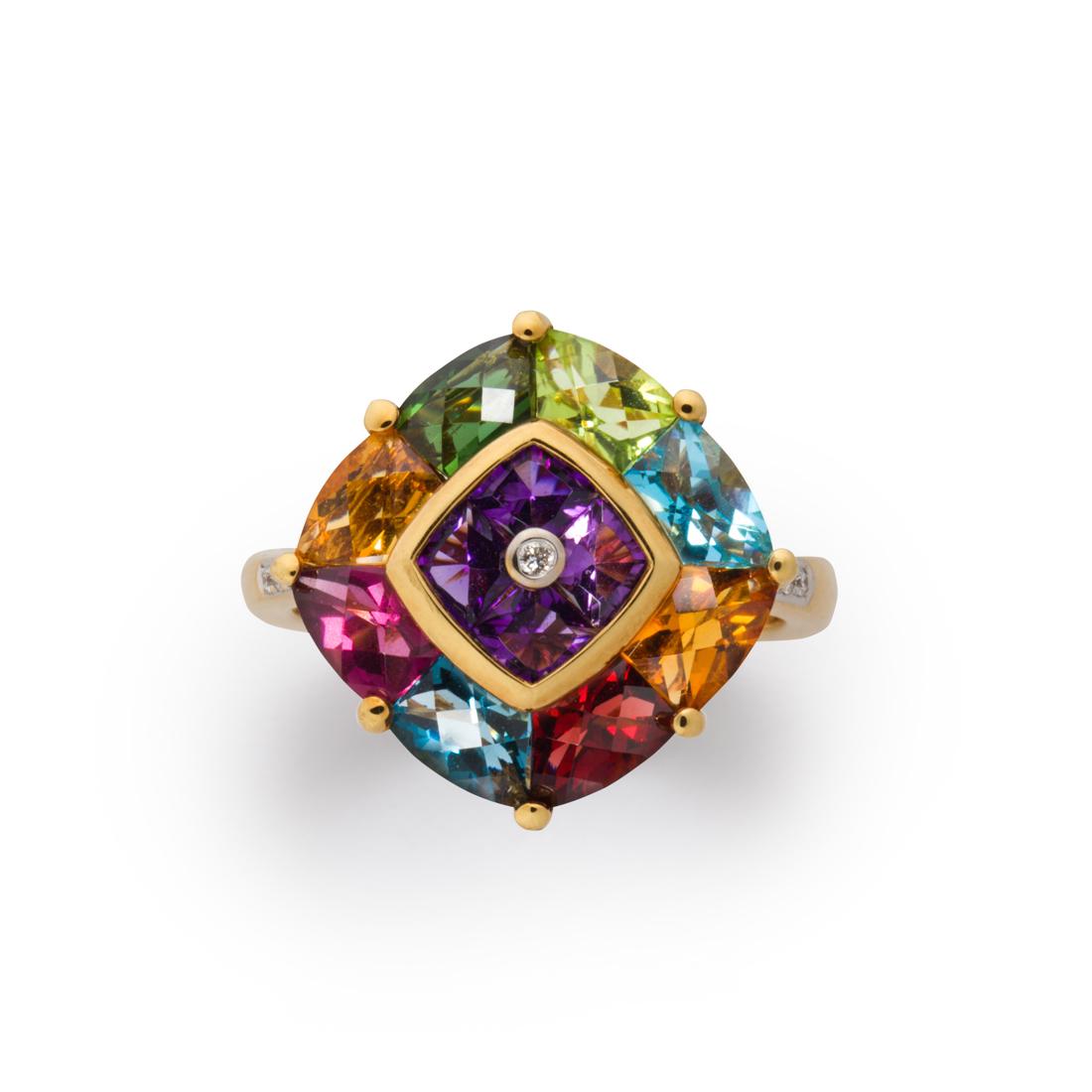 A gemstone and eighteen karat gold ring (1 of 2)
