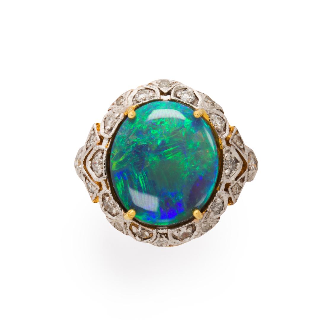 A un-treated black opal, diamond and eighteen karat bi-color gold ring (1 of 3)