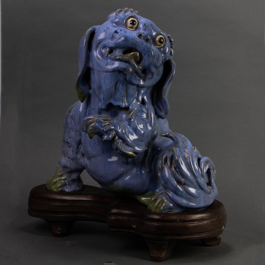 Chinese flambe glazed figure of a guardian lion (1 of 3)