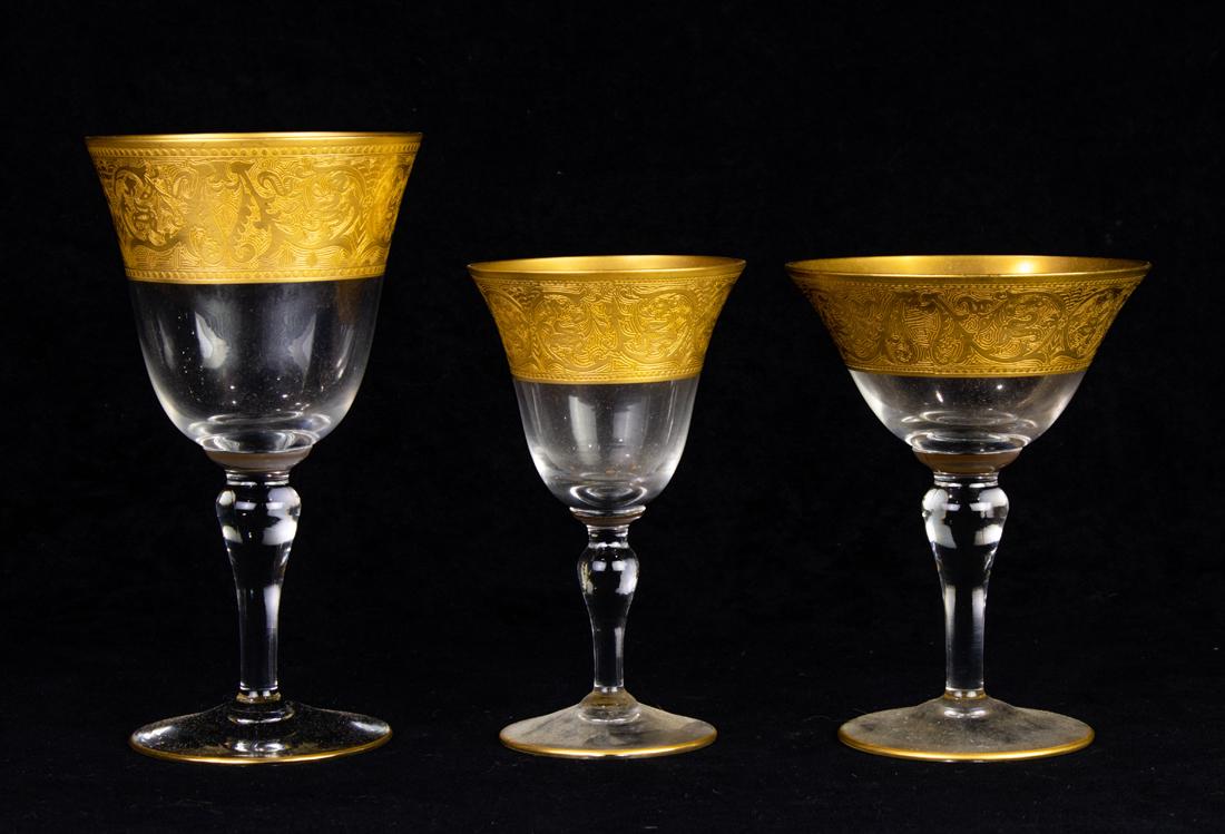 (Lot of 17) Glastonbury-Lotus tooled gilt rimmed stemware in the Georgian Gold pattern: (Lot of 17) Glastonbury-Lotus tooled gilt rimmed stemware in the Georgian Gold pattern, comprising (4) goblets, 6.75"h; (8) wine, 5.25"h and (5) saucer champagne, 5.25"h. Provenance: Property of a pro