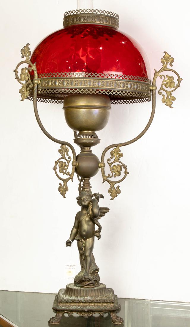 Victorian patinated metal and red glass figural oil lamp (1 of 1)
