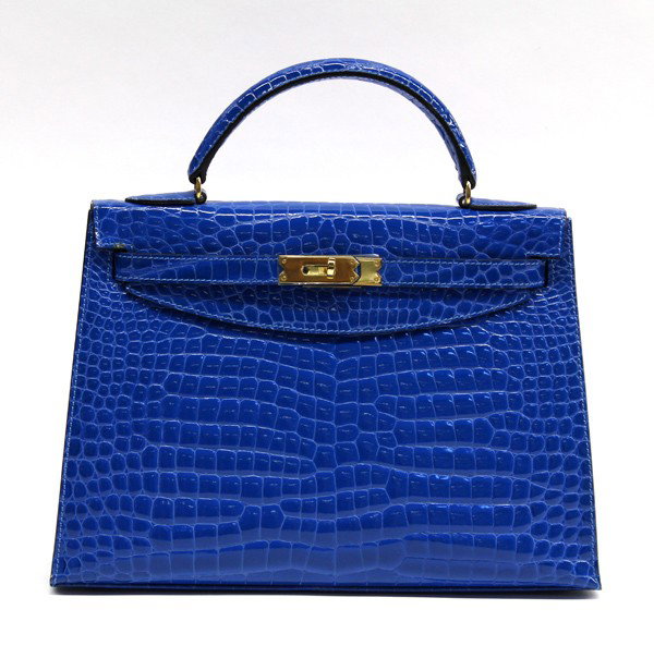 Lederer 32 patent electric blue kelly bag: Lederer (Hermes) 32 patent electric blue porosus crocodile Kelly bag with gilt hardware, includes attachable shoulder strap, marked Lederer De Paris Made in Italy, note: all measurements are in centim