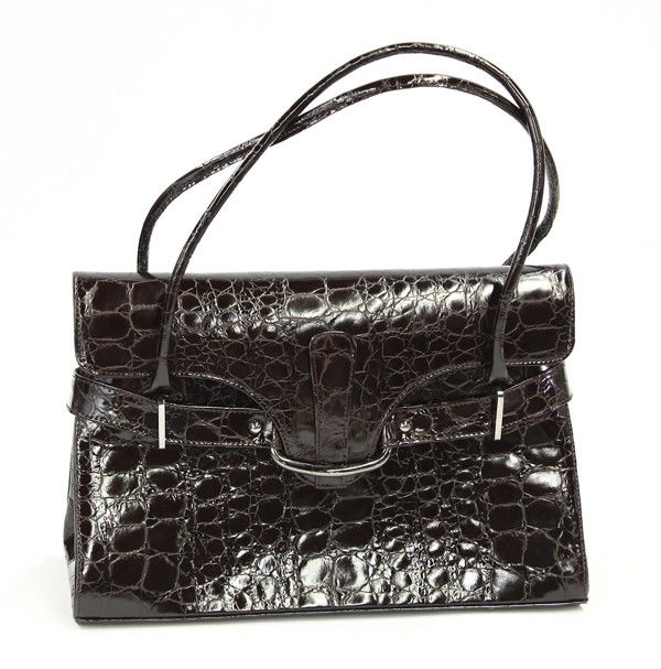 Stuart Weitzman reptile handbag: A Stuart Weitzman dark chocolate reptile handbag, 8.25''h x 11''w x 5''d