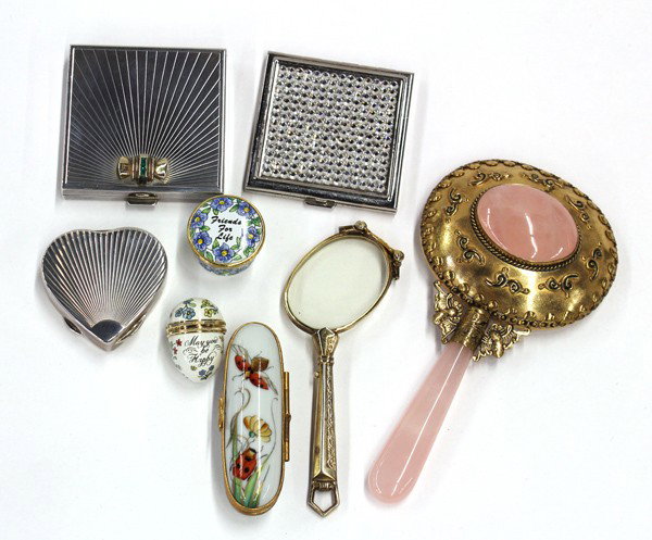Lady's cosmetic acessories: (Lot of 8) Associated lady's accessories including a hand mirror, compacts, Limoges boxes, lorgnette glasses, together with Tiffany dust pouches