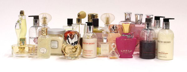 Designer cologne: (lot of 23) Associated perfumes and body lotions including Estee Lauder, Van Cleef and Arpels, Laura Mercier, Atelier, Vicky Tiel, Houbigant, Vicolo, Fiori, Susan Lucci, Cuir Beluga, etc.