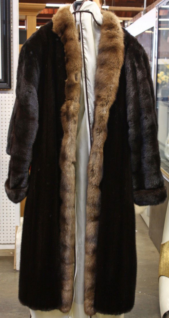 I. Magnin coat: I. Magnin dark brown full length mink tuxedo coat with a sable fur trim