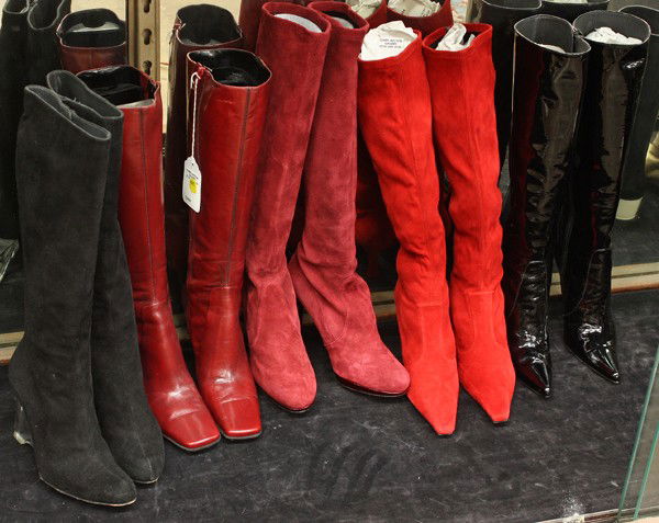 Designer fashion boots: (lot of 5 pairs) Associated womens's designer high boots consisting of Stuart Weitzman and Nine West, colors including lipstick red, cranberry, scarlet red, and noir, size 6