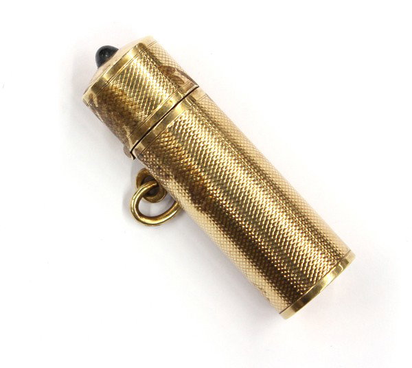 yellow gold plated perfume case: 14k yellow gold plated perfume case with blue cabochon hinged top accent. Total case weight 18.6 grams