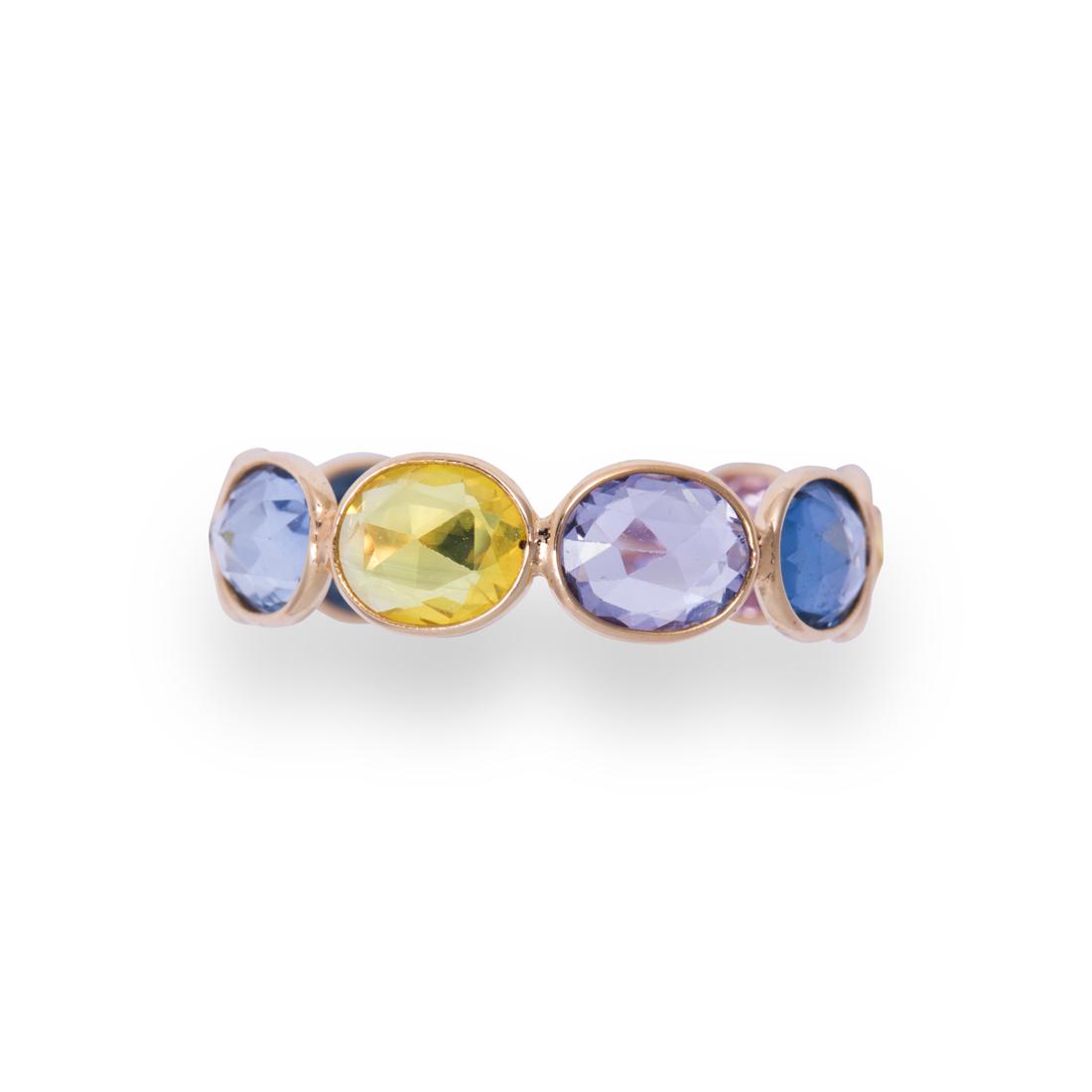 A fancy colored sapphire and eighteen karat gold ring (1 of 2)