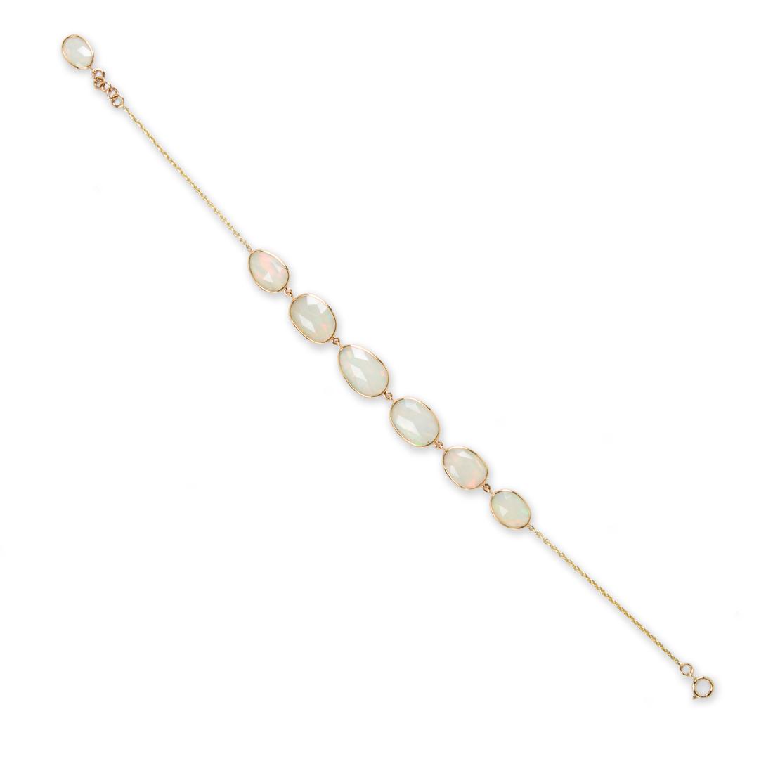 An opal and eighteen karat gold bracelet (1 of 2)