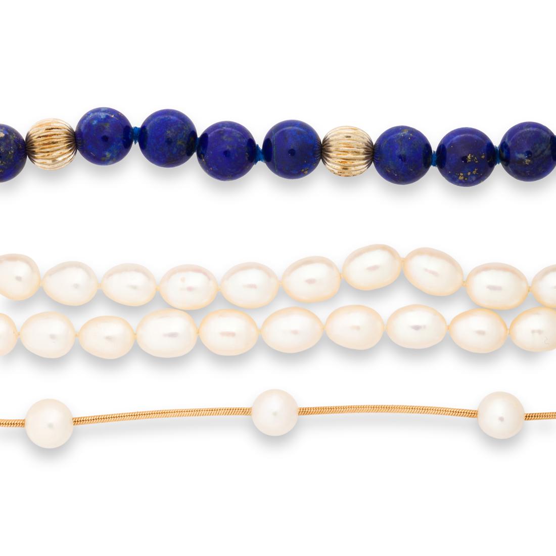 A group of fourteen karat gold necklaces (1 of 4)