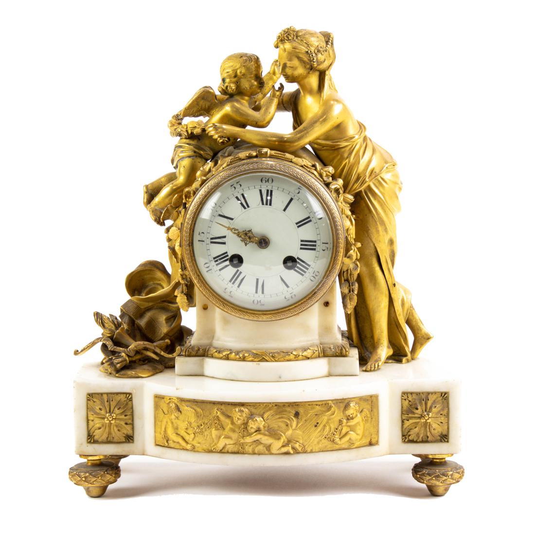 A Louis XVI style gilt bronze mounted marble figural mantel clock, 19th century (1 of 5)