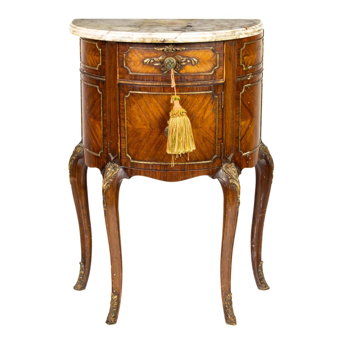 A Louis XV style demilune chest (1 of 4)