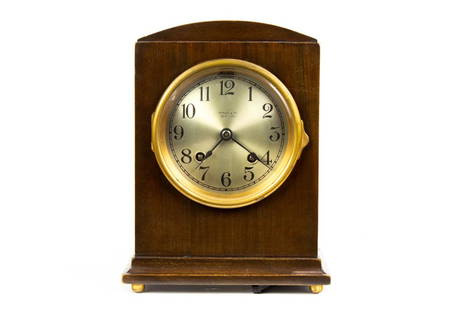 Chelsea Clock Company mahogany clock retailed by Tiffany & Co.: Chelsea Clock Company mahogany clock retailed by Tiffany & Co., New York, second quarter 20th century, the arched case indistinctly impressed '189048 108', 8.75"h