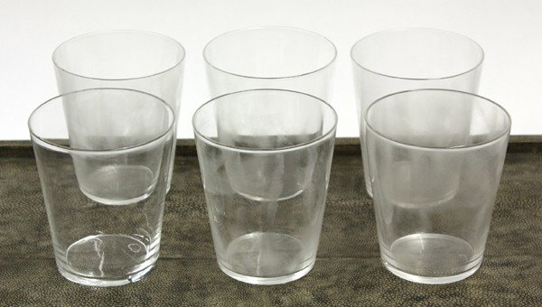Steuben tumblers: (lot of 7) Steuben crystal tumblers consisting of six tumblers and original box, 4.5'' x 4''diam.