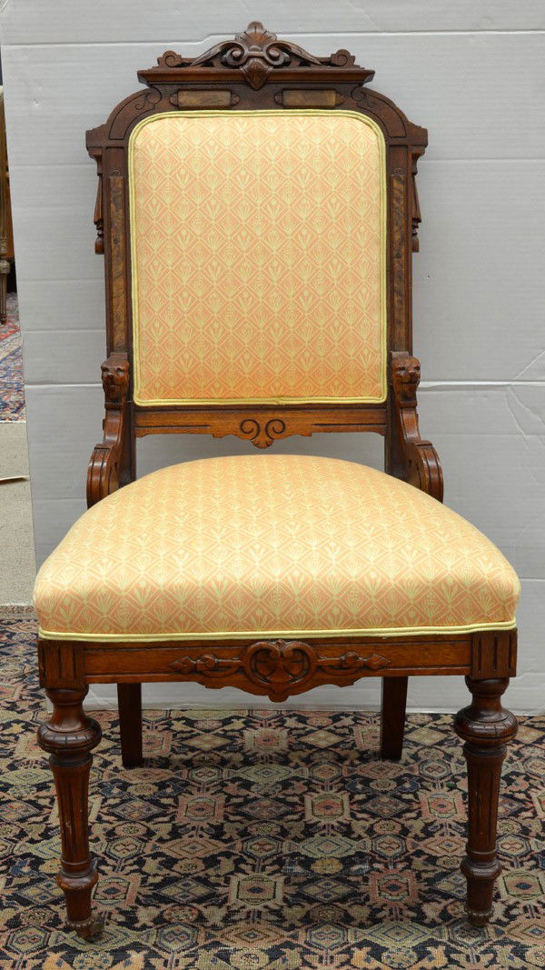 Victorian renaissance revival side chair: Victorian Renaissance Revival upholstered mahogany side chair, raised on ring turned and fluted front legs, ending with casters, 40.5''h x 17''w x 19''d