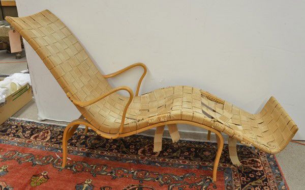 Bruno Mathsson chaise lounge: Bruno Mathsson and Karl Mathsson chaise lounge, circa 1950, with webbing over a laminated beech wood frame and footrest, retains two origianal Bruno Mathsson paper lables, 36.25''h x 53.5''w x 24.5''d