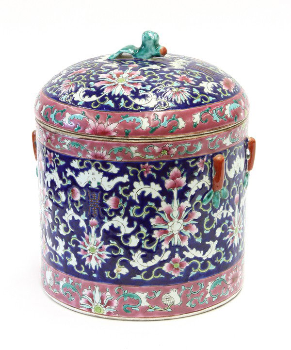 Chinese Enameled Porcelain Tureen: Chinese polychrome enamel decorated porcelain tureen, the cylindrical body patterned with lotus blossoms accented with scrolling tendrils together with auspicious bats and shou characters set against 