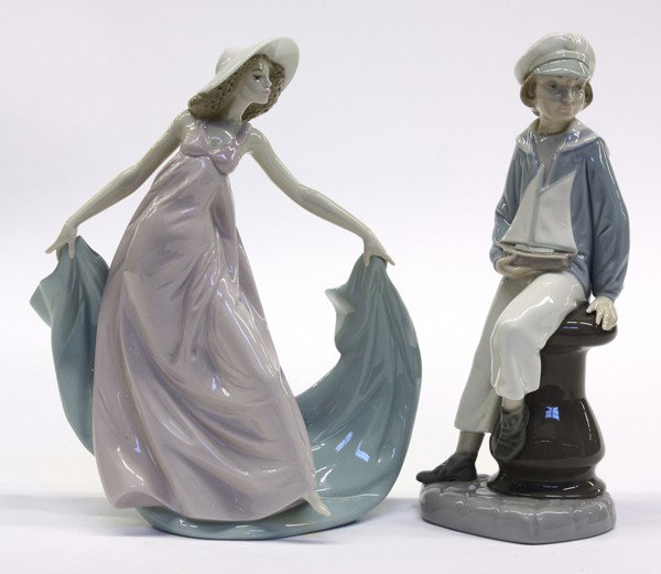 Lladro porcelalin figurines: Two Lladro porcelain figurines including ''Spring Dance'' issued 1990 retired 2006, sculpted by Jose Puche, 9''h; together with ''Little Sailor Boy'' 1996-1999, 8.75''h