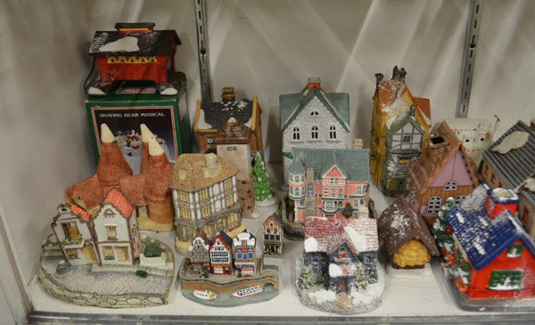 Architectural scale models: One shelf of associated architectural scale models, including decorative ceramic, houses include cottages, chalets, mansions, churches, lighthouses, etc