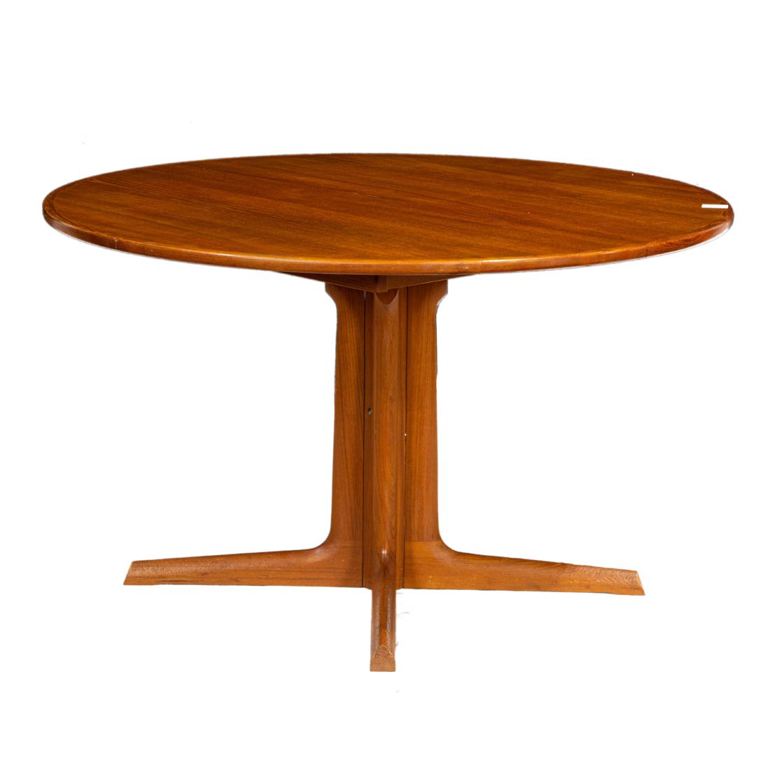 A Danish Modern Godme Mobilfabrik teak dining table: A Danish Modern Godme Mobilfabrik teak dining table, attrib. to Niels Moller, having a circular top, and rising on a conforming base, 28"h x 48"d