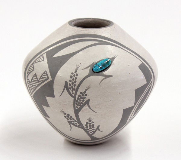 Stella Teller/ Isleta Pueblo vase: Stella Teller, (Isleta Pueblo) monochrome and inlaid turquoise vase, having a bulbous body with a corn stalk surmounted with a turquoise cabochon and surrounded with stylized geometric detail, signed