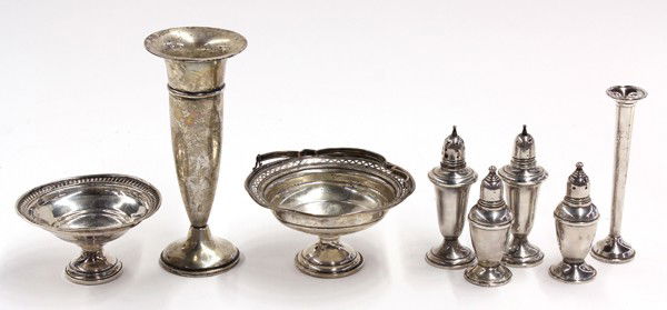 Sterling table articless: (lot of 8) Sterling silver weighted table accessories by Wallace, Quaker Silver Company, Reed & Barton, Empire, and Elgin Silversmith Company, including two pairs of salt and pepper shakers, two vases