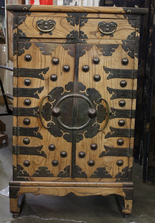 Korean Wooden Storage Cabinet: Korean wood cabinet with desk insert, the top with a row of two drawers above a pair of hinged doors opening to reveal a drop-down desk above two stacks of three drawers, all supported on a separate f