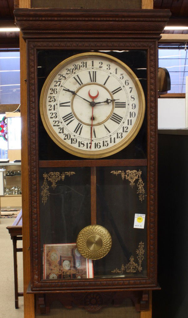 Wall clock: Sessions carved walnut regulator calendar wall clock, 38.5''h x 18.75''w x 5.25''d