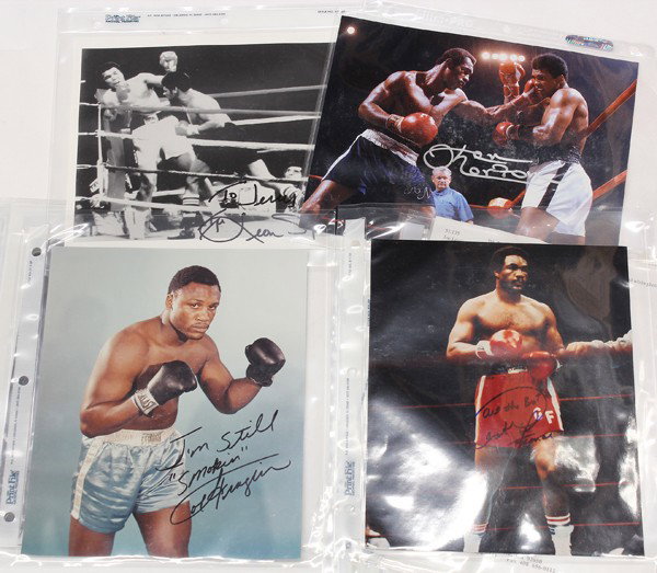 Autographed Boxing photographs, Joe Louis: (lot of 5) Associated autographed boxing photographs, including a Joe Louis signature on card, together with four photographs, with Joe Fraizer, George Foreman, Leon Spinks, Ken Norton, together with 