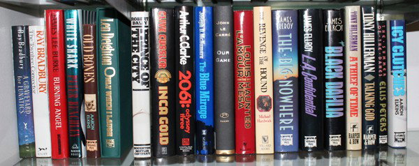 Autographed fiction & non-fiction books: (lot of 20) Associated autographed fiction and non-fiction books, some inscribed, including Ray Bradbury, The Toynbee Convector and A Graveyard for Lunatics; James Lee Burke, Burning Angel; Peter Benc