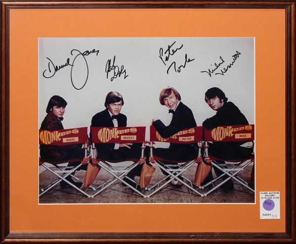 Monkeys autographed photograph: Framed autographed Monkeys photograph, signed by Micky Dolenz, Davy Jones, Peter Tork, and Michael Nesmith, overall: 15.75'' x 18.5'', photograph sight: 10.75'' x 13.75''