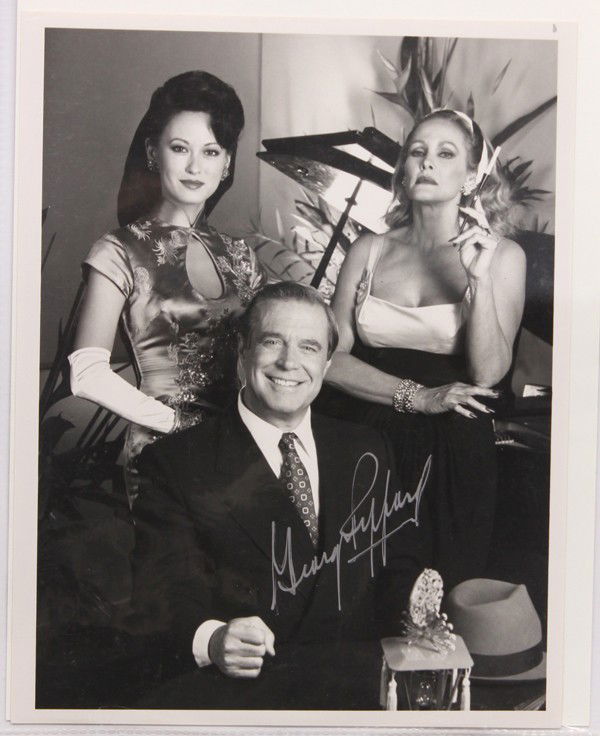 Autographed movie star photographs: (lot of 20) Associated autographed movie star photographs, including Robert Mitchum, MacKenzie Phillips, George Peppard, Carroll O'Connor, Duncan Regehr, etc. Each photograph measures 10'' x 8''