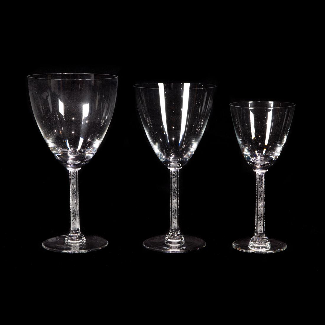 Lalique, Phalsbourg Stemware, Set of 33: Lalique, Phalsbourg Stemware, Set of 33 France, glass, engraved factory signature, comprising (9) goblets, 7.5"h; (12) goblets, 7"h and (12) wine, 6.5"h.