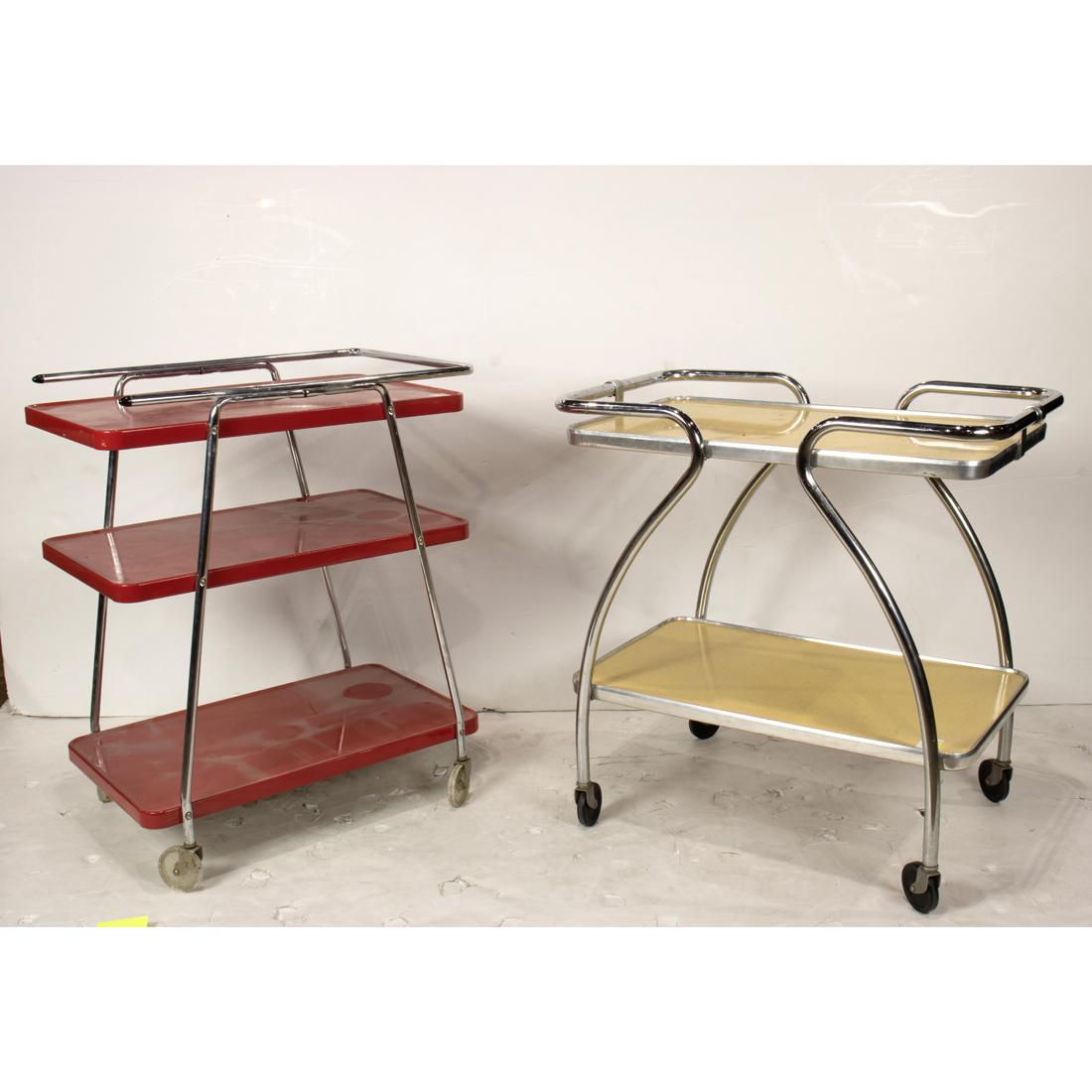 (Lot of 2) Modern chrome tea carts: (Lot of 2) Modern chrome tea carts, one having red shelves, the other yellow, largest: 32"h x 24"w