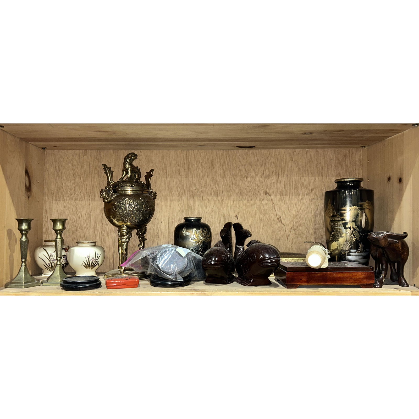Shelf of mostly Japanese decorative objects: Shelf of mostly Japanese decorative objects