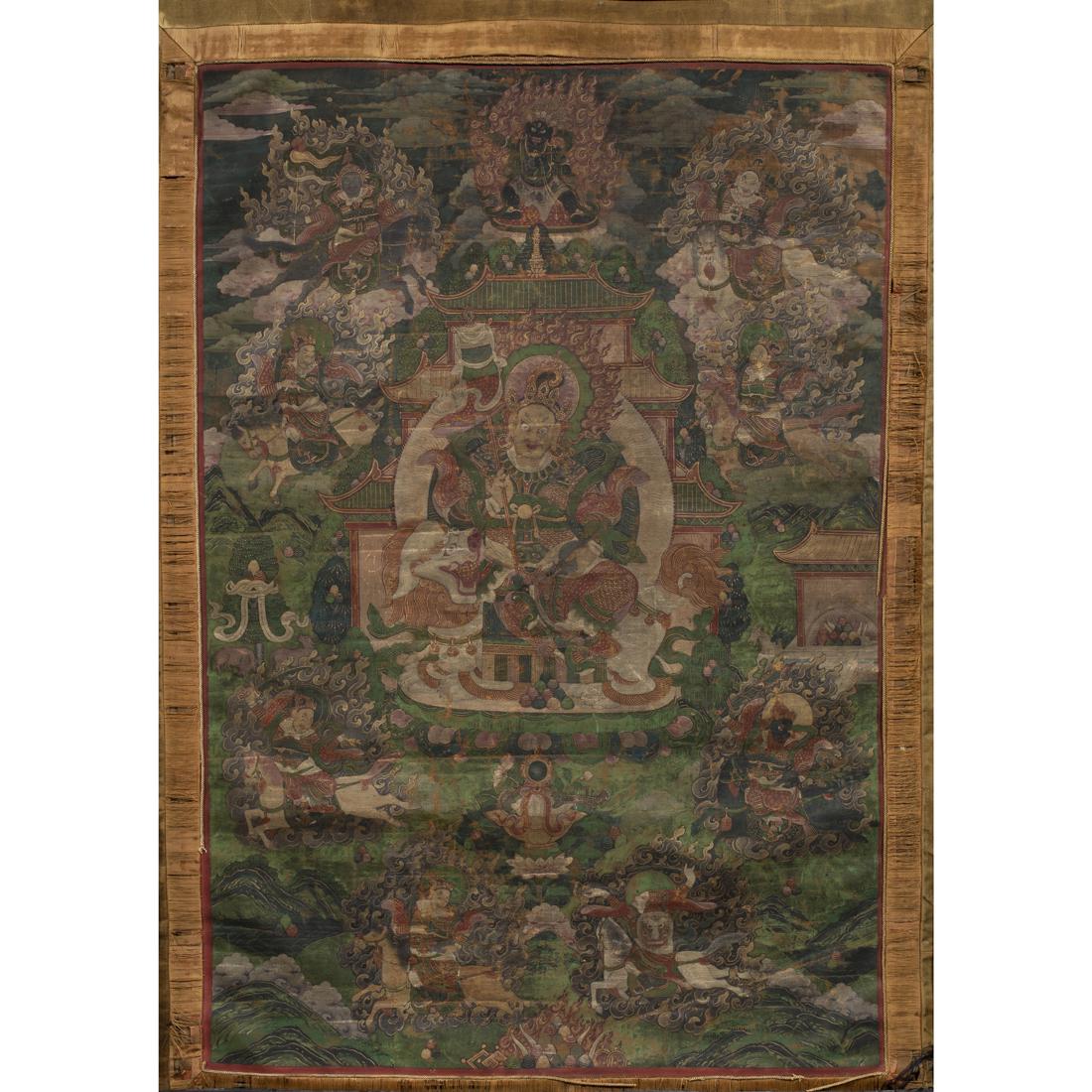Tibetan thangka of Vaishravana: Tibetan thangka of Vaishravana, distemper on cloth, mounted in gold-woven silk, 27" x 18.5".