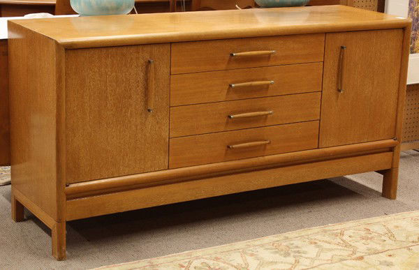 Paul Laszlo for Brown Saltman mahogany buffet: Paul Laszlo for Brown Saltman mahogany buffet, the cabinet front and surface has a bullnose edge, below are four drawers divided equally, the top drawer retaining the original label, the central drawe