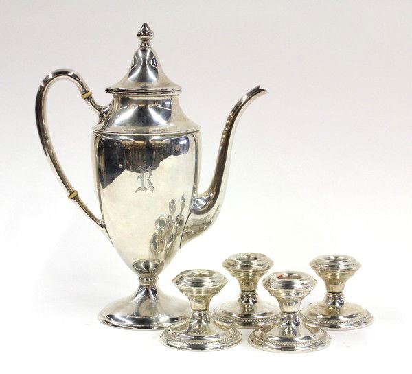 Sterling table accessories: (lot of 5) American sterling silver table accessories including a Shreve & Company hot beverage pot, 14.41 troy oz.; together with two pairs of 2.25''h weighted single candle holders by Newburyport Si