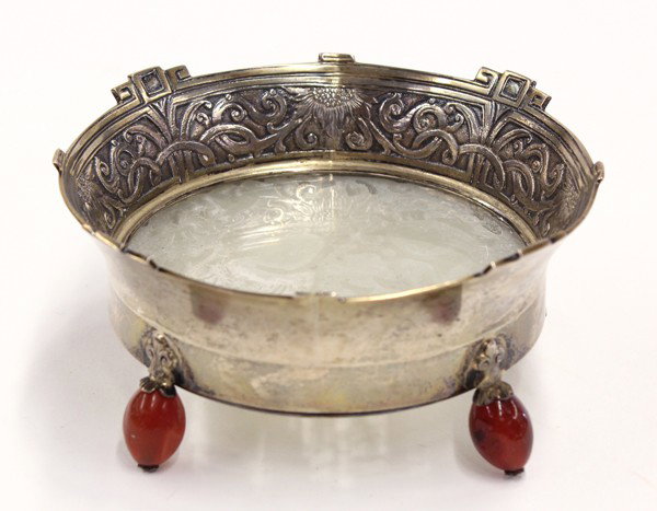Chinese Jade Plaque in Edward Farmer Silver Mount: Assembled sterling silver and Chinese jade stationary tray with mountings by Edward Farmer, the reticulated nephrite plaque carved with Hehe Erxian characteristically carrying a box or holding a lotus