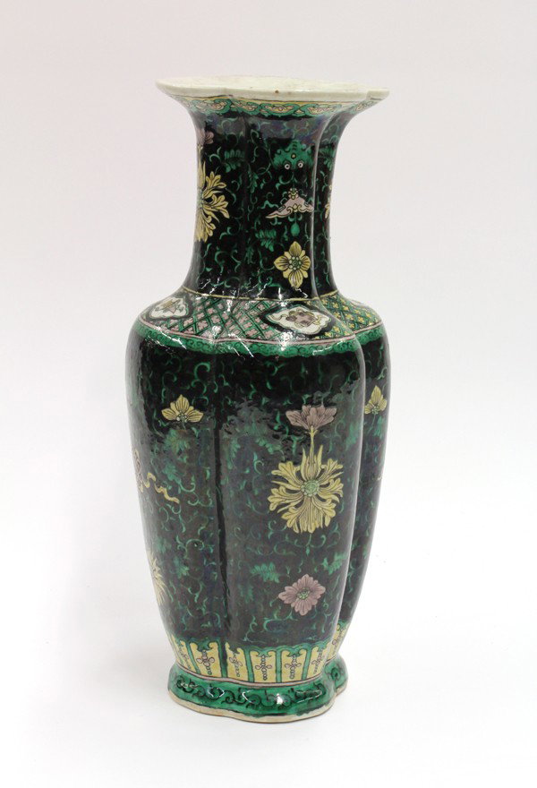 Chinese Famille Noire Lobed Vase: Chinese famille noire enameled lobed porcelain vase, late Qing/Republic period, of quatrelobe form with yellow and aubergine lotus accompanied by green bats and scrolling tendrils on a black ground, t