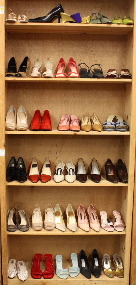 Designer shoes: (lot of 30 pairs) Six shelves of associated sandals, pumps, stilettos, including Miu Miu, Dolce & Gabana, Donna Karan, DKNY, Furla, Luciano Padovan, Gucci, Escada, Burberry, etc. size 6-6.5. Provenanc