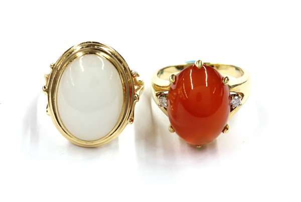 (Lot of 2) GUMPS rings: (Lot of 2) GUMPS rings; (1) mounted in 18k yellow gold, set with carnelian and diamond accents. Total ring weight 9.0 grams. (1) mounted in 14k yellow gold, set with white jade. Total weight 6.2 grams
