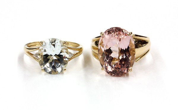 Pink beryl/morganite and aquamarine rings: (Lot of 2) Pink beryl/morganite and aquamarine rings; both mounted in 14k yellow gold, one set with (1) oval cut pink beryl/morganite; the other set with (1) oval cut aquamarine, accented by (2) round