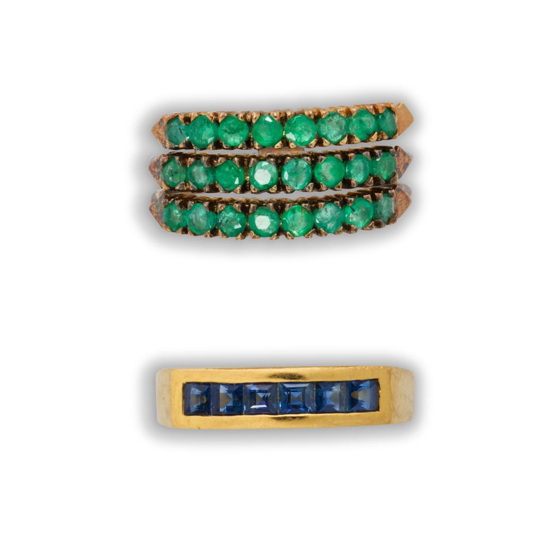A group of emerald, sapphire and eighteen karat gold rings (1 of 2)