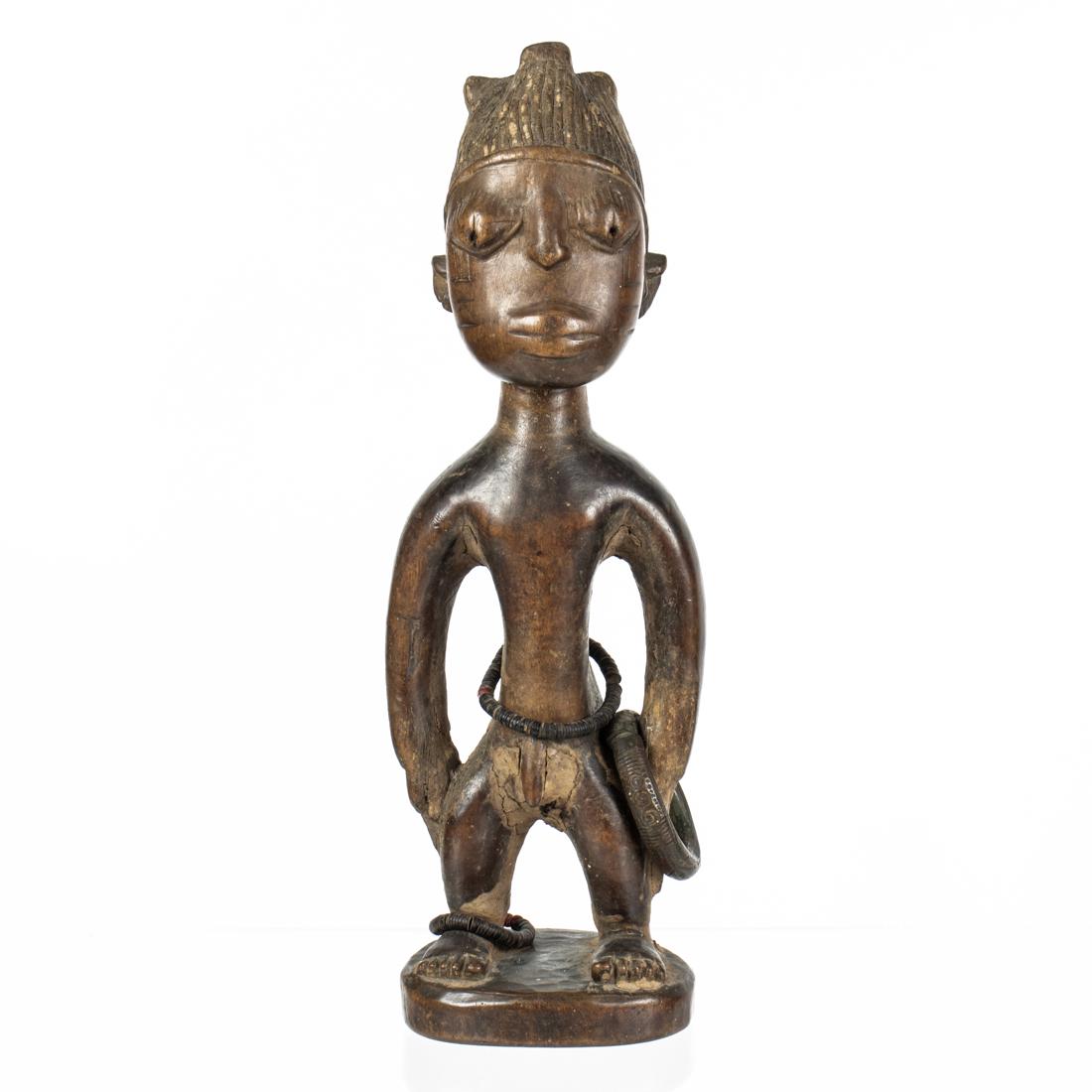 A single male Ibeji twin figure, Yoruba, Nigeria (1 of 4)