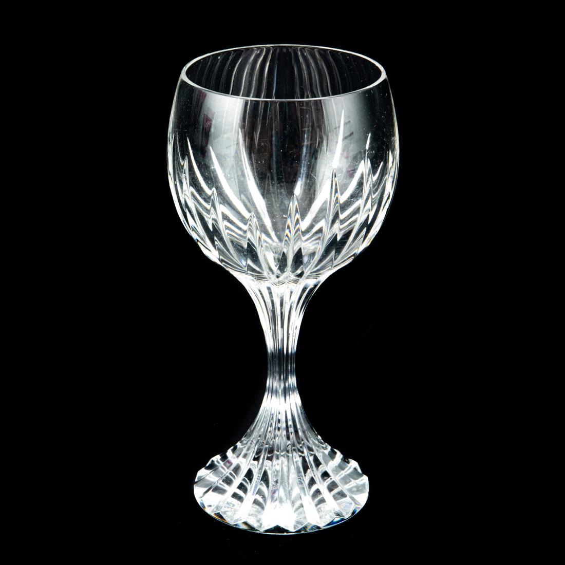 (Lot of 11) Baccarat cut glass stemware in the Massena pattern: (Lot of 11) Baccarat cut glass stemware in the Massena pattern, acid etched factory mark, comprising (4) goblets, 7"h and (7) wine, 6.5"h.