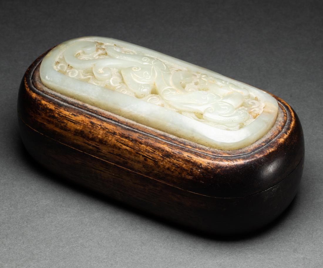 Chinese wood box cover with white jade openwork plaque (1 of 2)