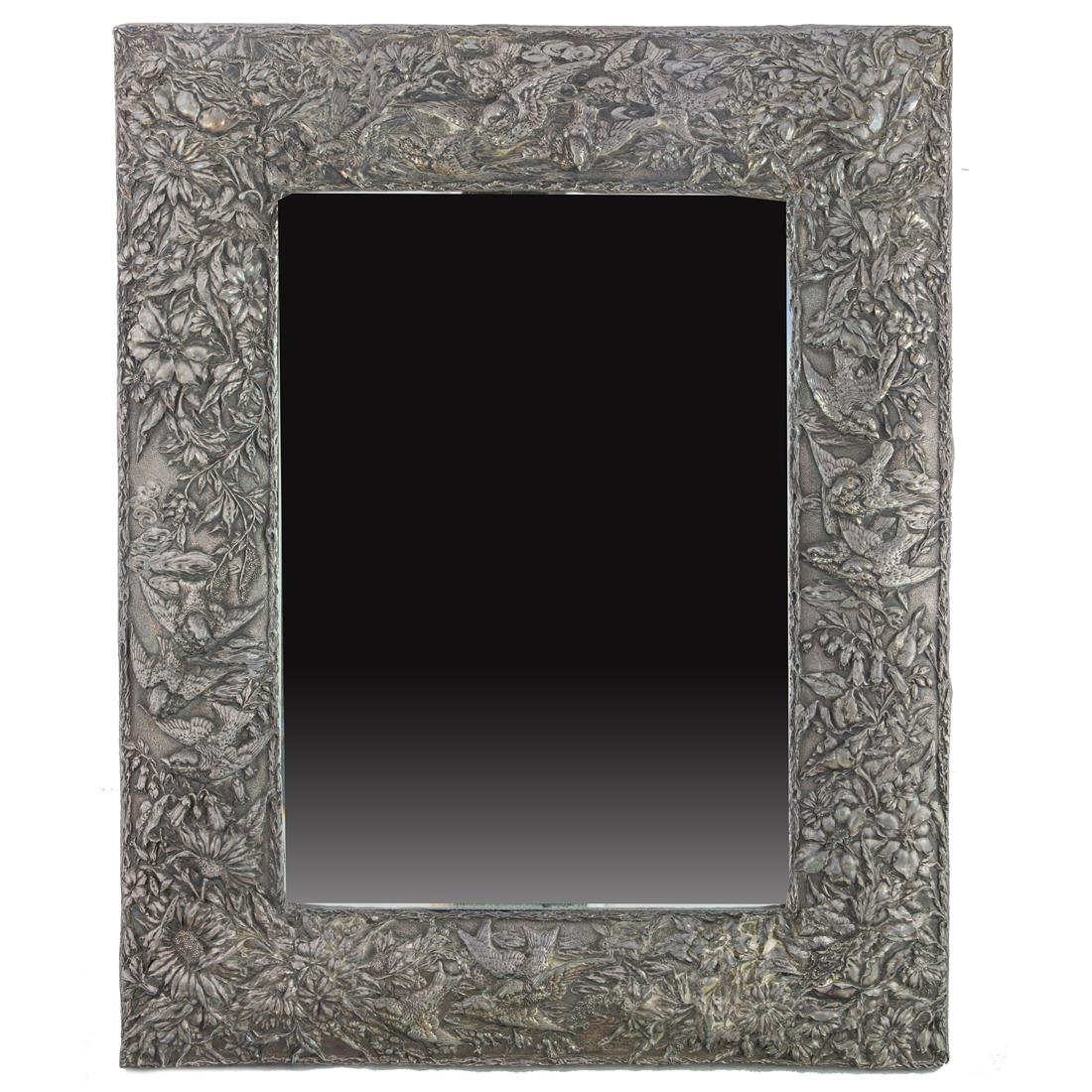 A large Aesthetic Movement repousse sterling mounted mirror (1 of 2)