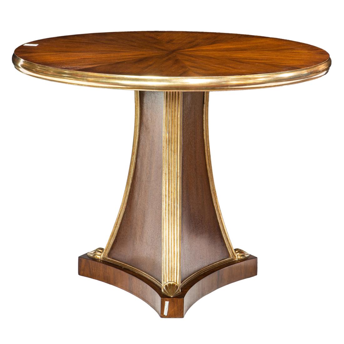 A Regency style parcel gilt kingwood center table (1 of 3)